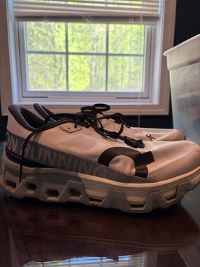 On Running Men's White and Black Athletic Shoes